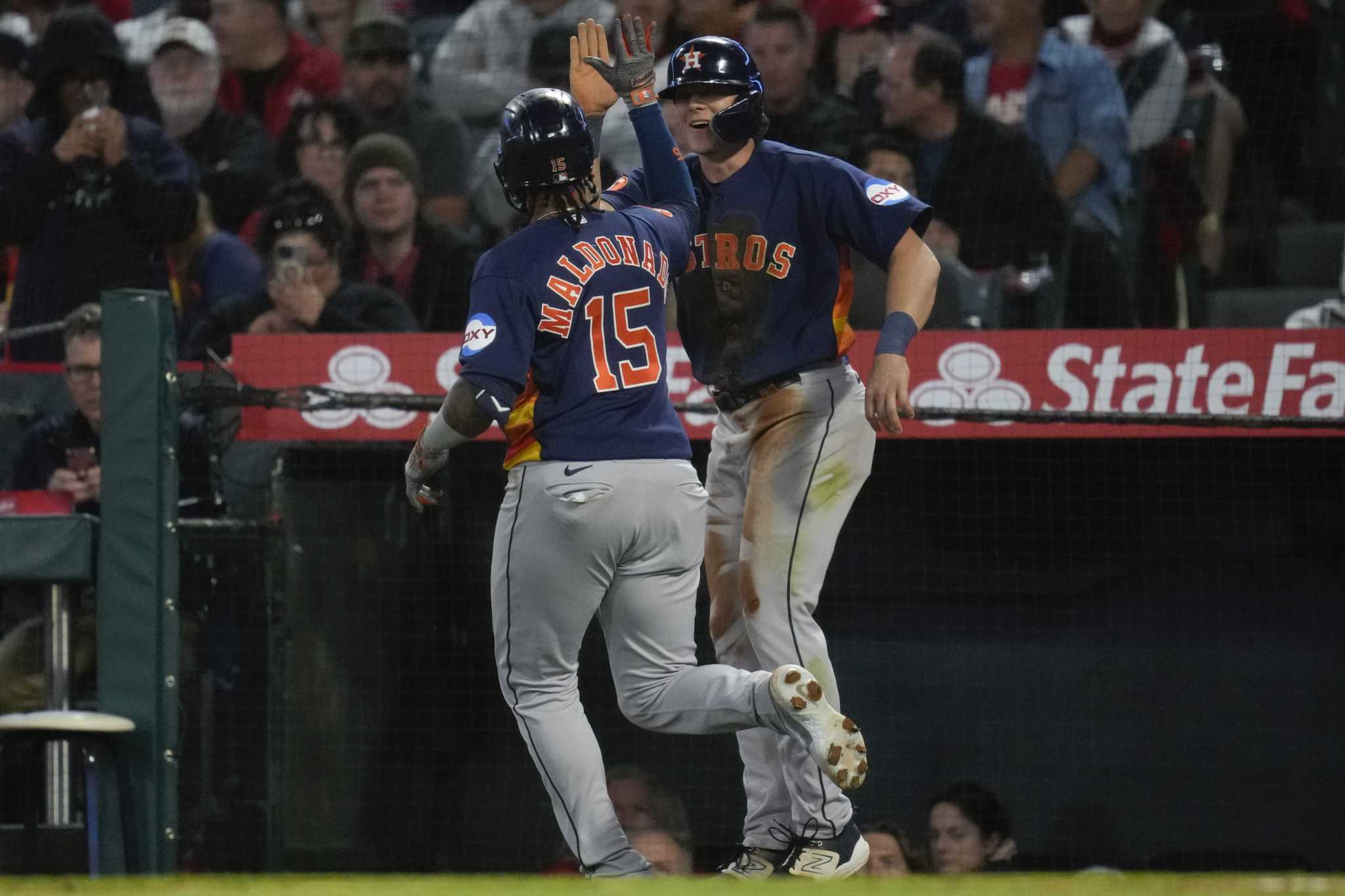 Emanuel goes 8 2/3 in relief in MLB debut, Astros bop Angels - The