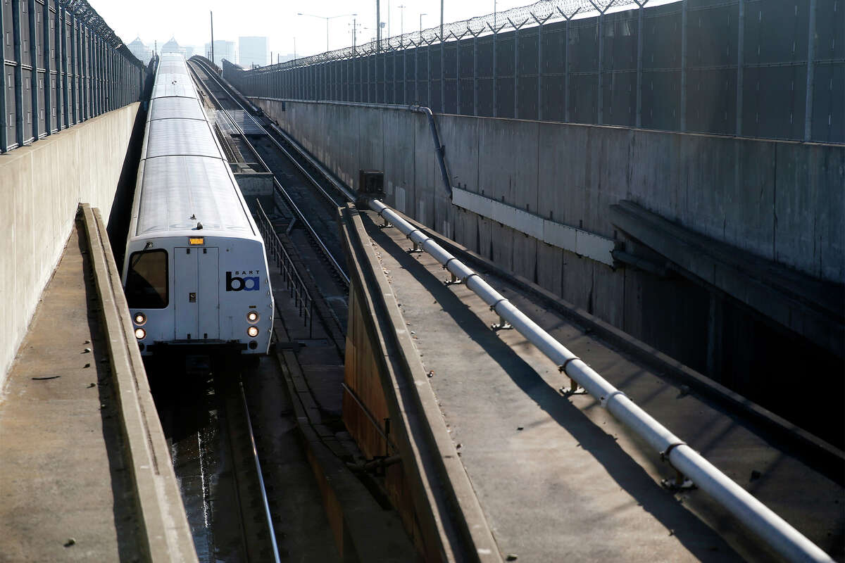 FILE - A westbound BART train enters the Transbay Tube in Oakland, Calif., on Friday, Feb. 16, 2018.