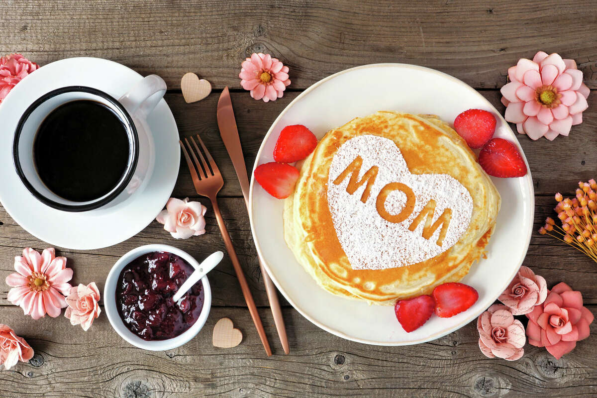 Celebrate Mother's Day at one of these local restaurants serving brunch. File photo: Pancakes with heart shape and MOM letters. 