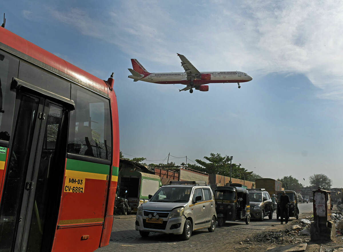 An Air India plane seen landing at the airport in Mumbai.