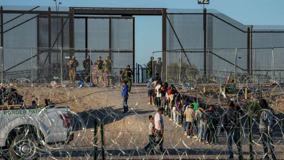Thousands of migrants are processed after crossing the Rio Grande from Ciudad Juárez to El Paso hoping to be able to seek asylum and enter the United States on Thursday, May 11, 2023.
