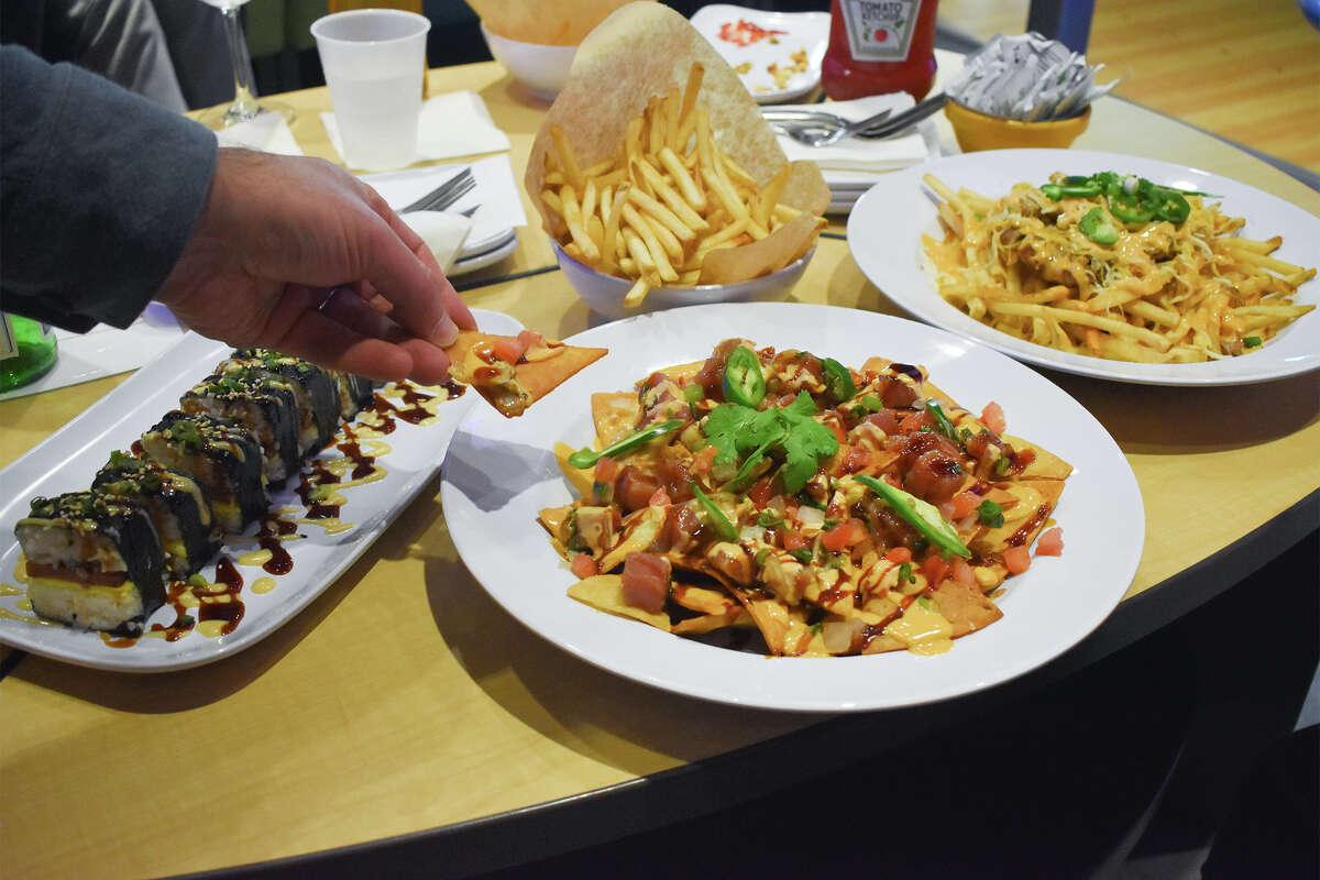 A big scoop of poke nachos from Sam Choy's Ohana Diner at Bowl Incline in Incline Village, Nev.