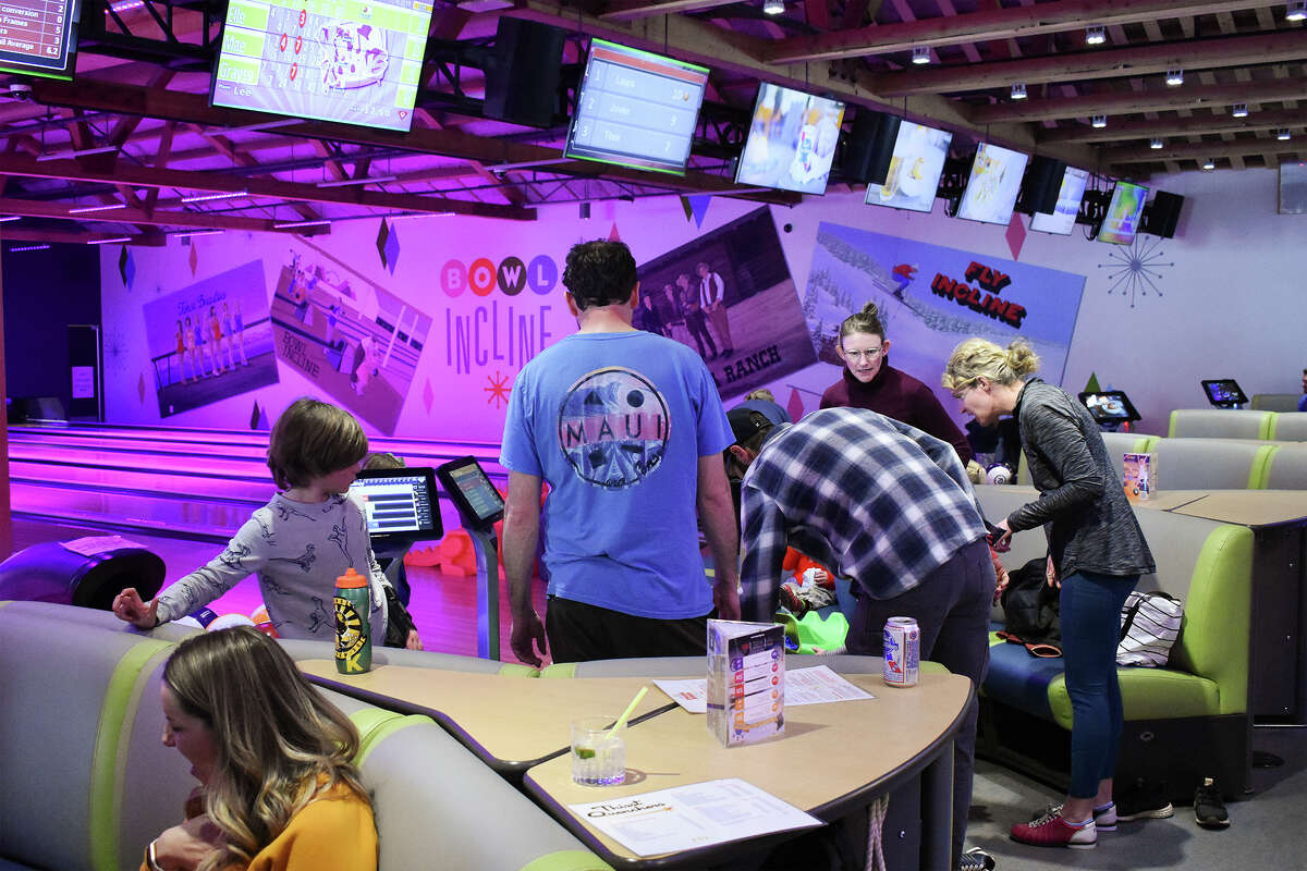 A family gathers for an afternoon of bowling, games and food at Bowl Incline in Incline Village, Nev.