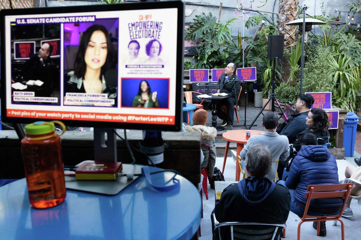A computer shows the virtual feed of a candidate forum featuring Reps. Barbara Lee and Katie Porter at El Rio in San Francisco on Friday. Both candidates are running for a seat in the U.S. Senate.
