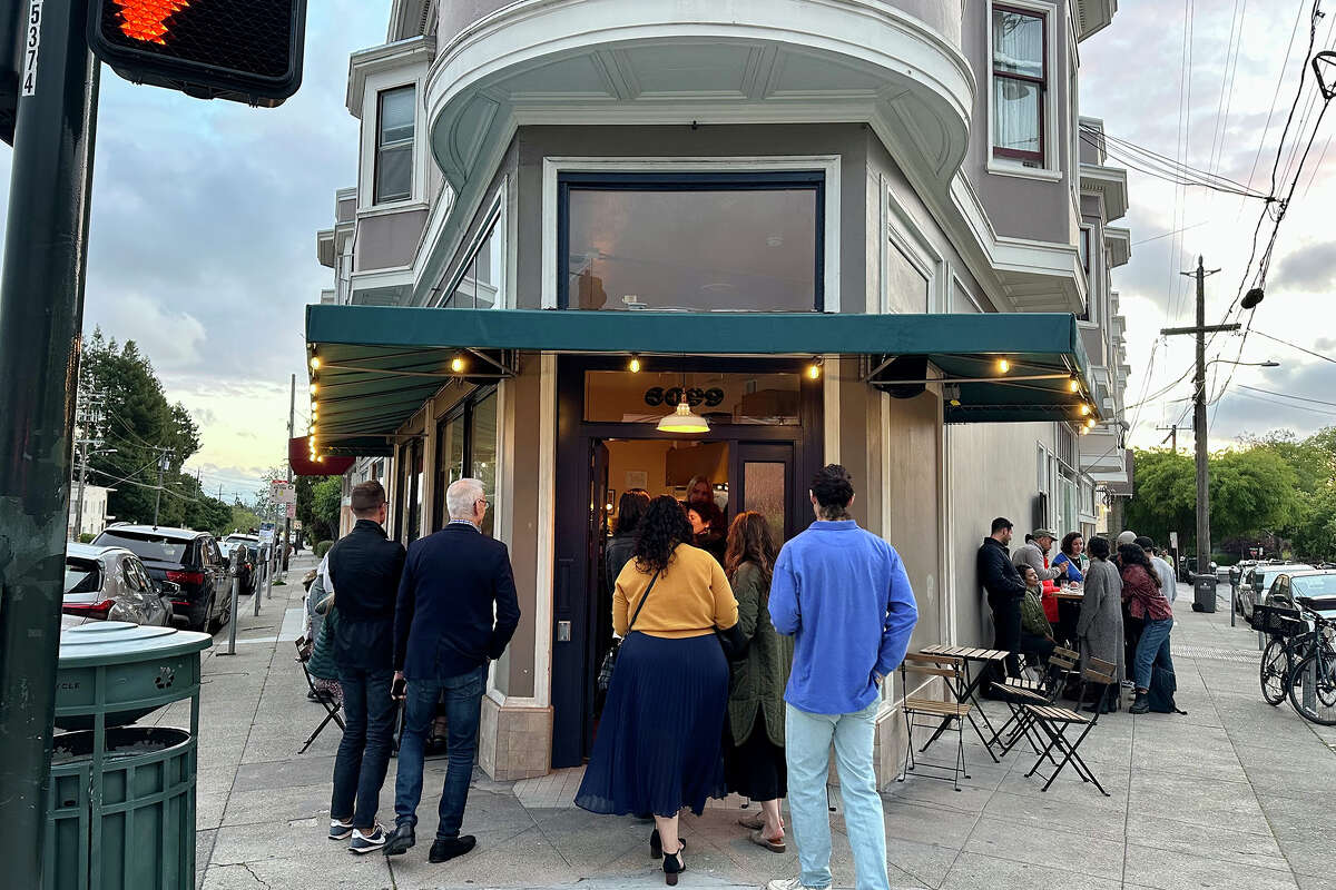 A line of customers forms outside of Sfizio, in the Rockridge section of Oakland, on the restaurant’s opening night.