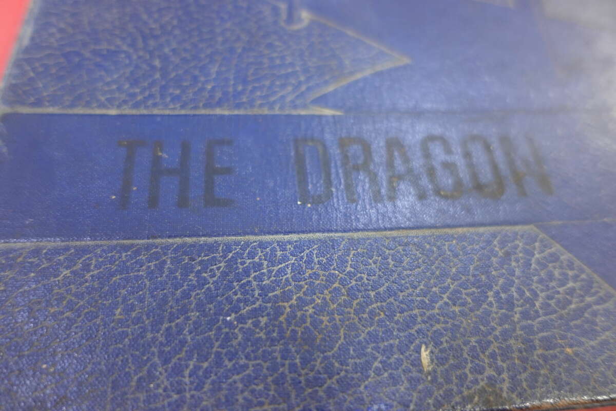 The first yearbook of what was then known as Henderson High School, prior to integration of the Hardin-Jefferson schools. The school was named for Principal James H. Henderson, the first Black principal at the school. The 1958-59 yearbook, "The Dragon," was created by the senior class. Photo taken May 11, 2023. Photo by Olivia Malick/ The Enterprise.