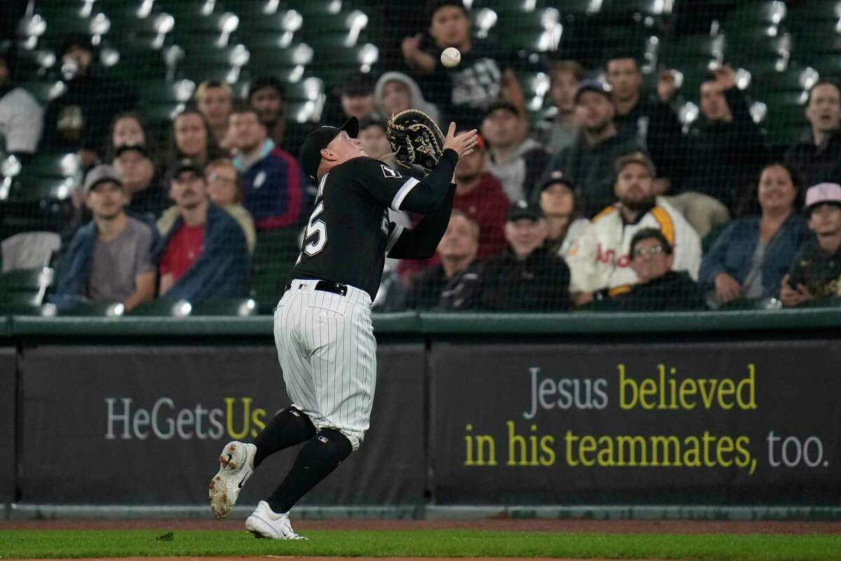 Chicago White Sox first baseman Andrew Vaughn catches a popout by Houston Astros' Mauricio Dubon during the first inning of a baseball game Friday, May 12, 2023, in Chicago.