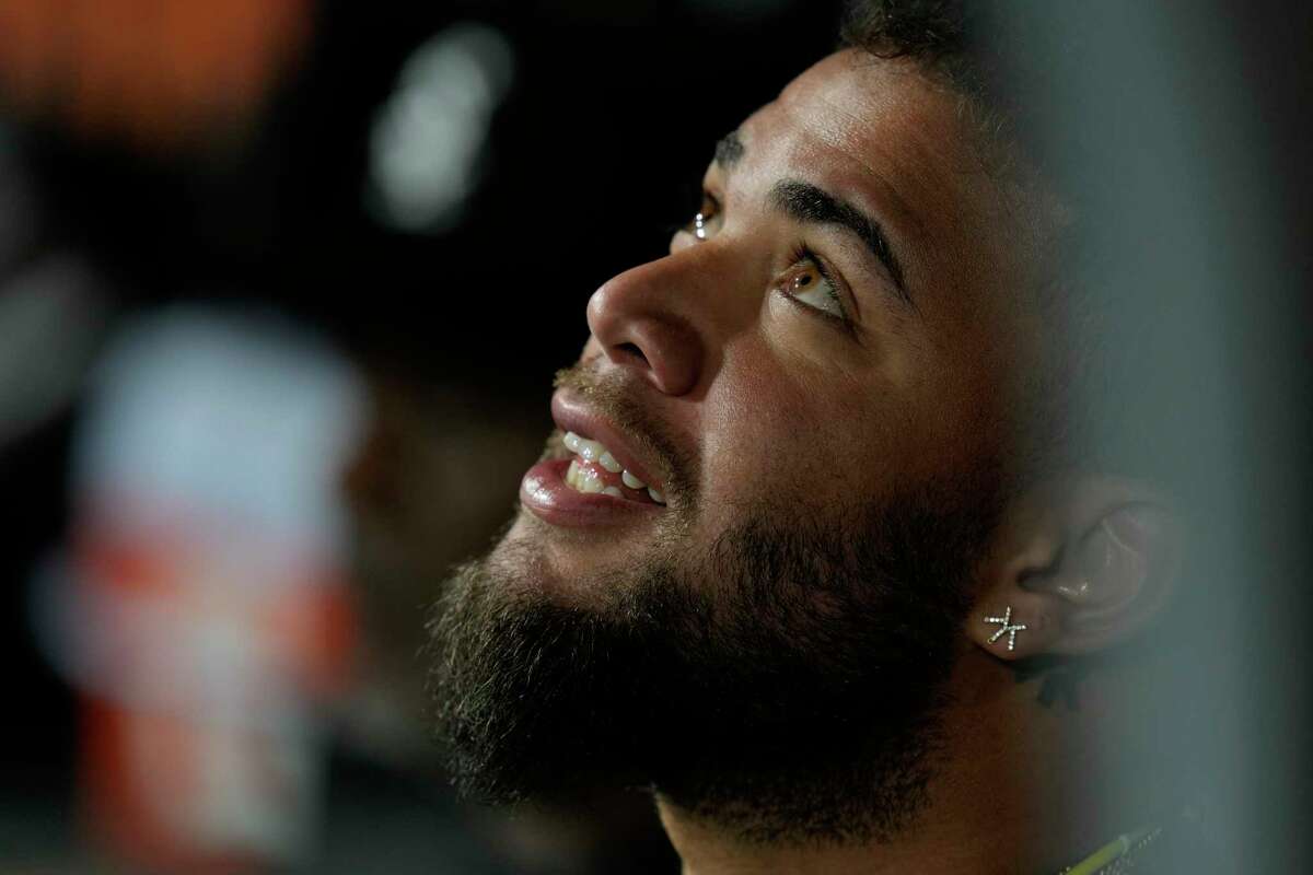 Chicago White Sox's Yoan Moncada waits in the dugout before a baseball game against the Houston Astros, Friday, May 12, 2023, in Chicago.