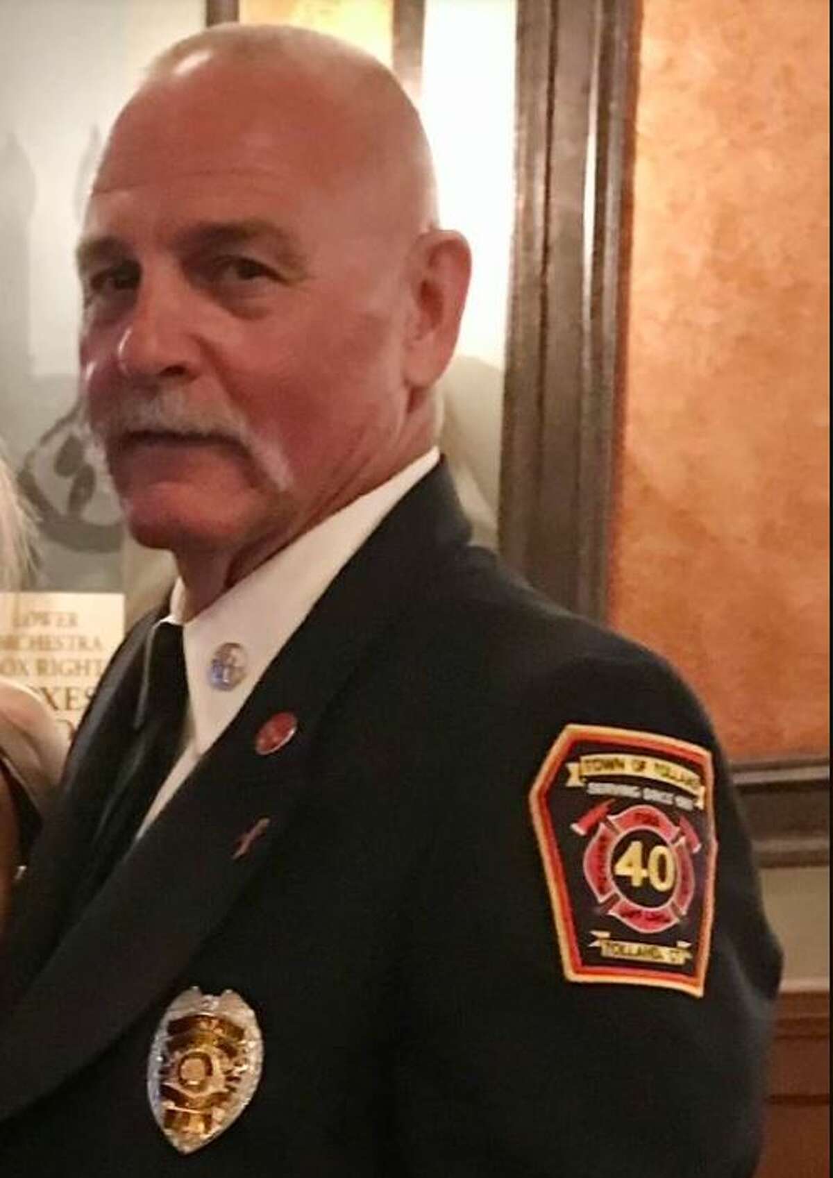 Family and friends mourn death of veteran Tolland firefighter