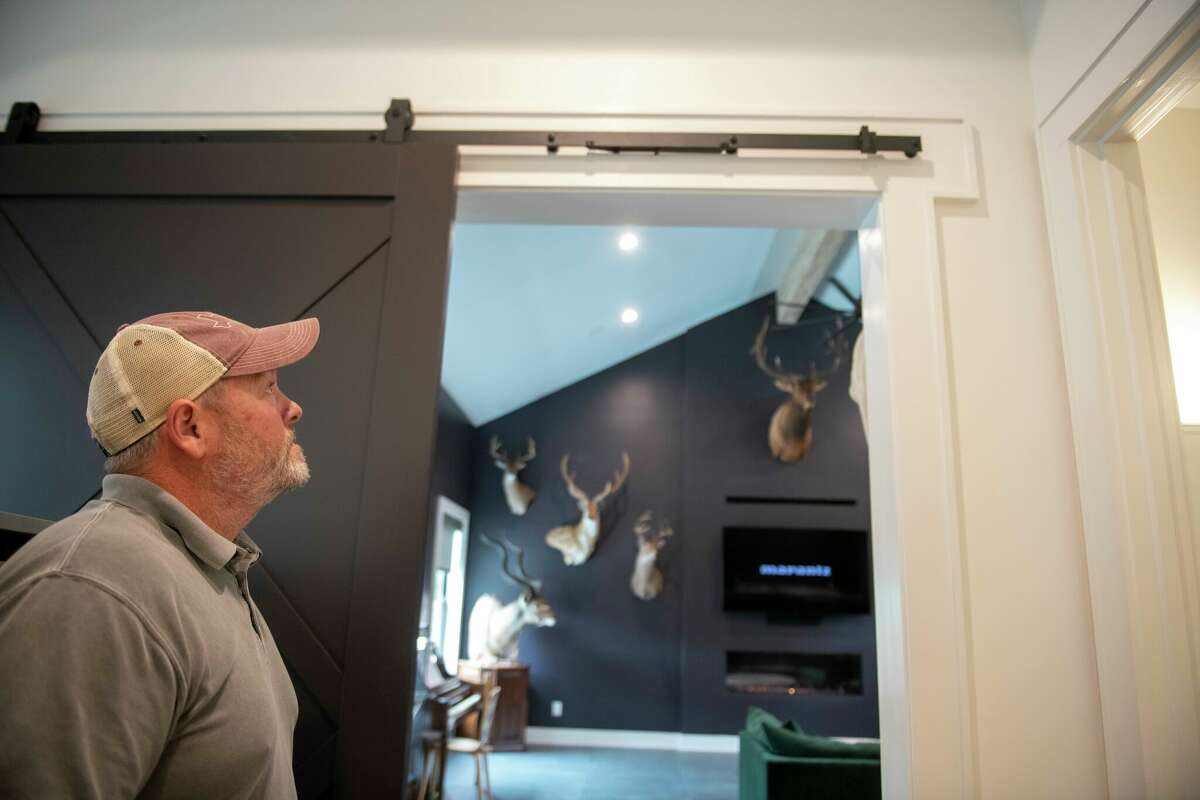 San Antonio smart house controls lights, security, music, shower temp
