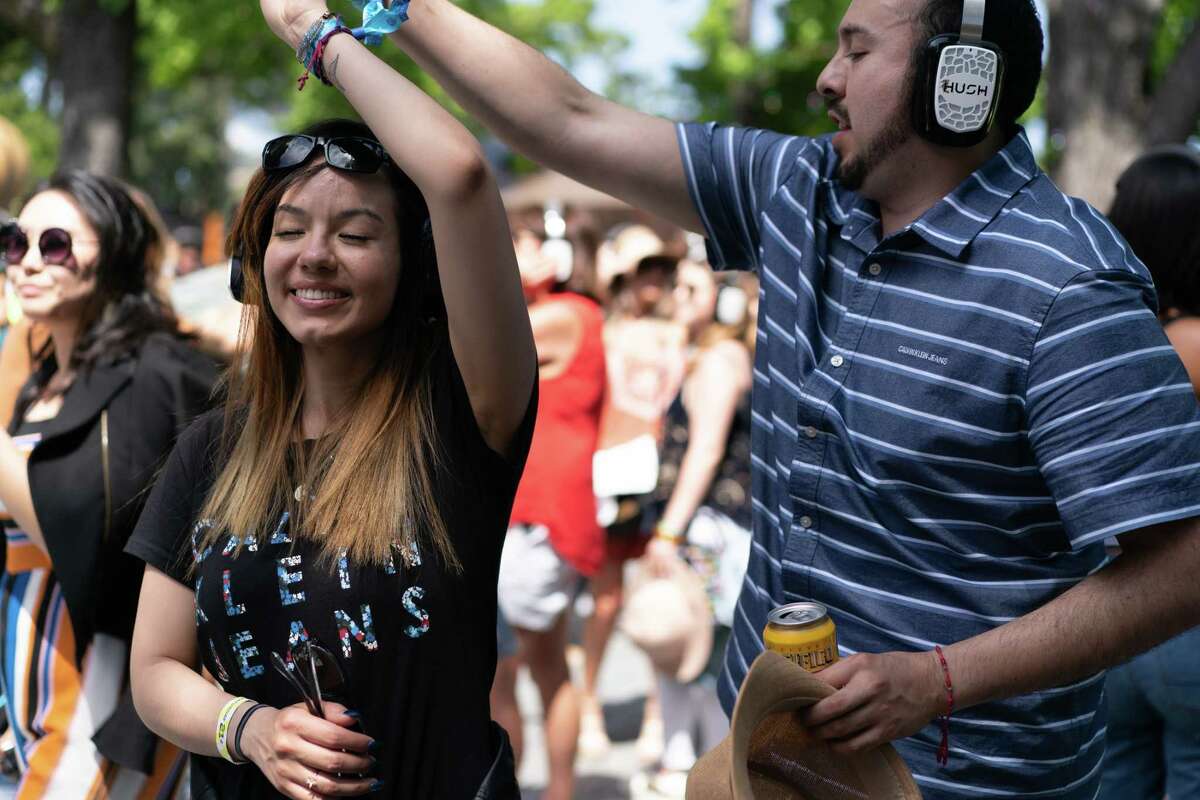 Alondra Baltazar (left) and Antonio Perez dance at Kaiser Silent Disco during the BottleRock Napa Valley festival in 2019.