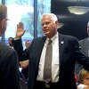 Mayor Roy West is sworn into office by Jefferson County Judge Jeff Branick during Tuesday's city council meeting. Photo made Tuesday, May 16, 2023 Kim Brent/Beaumont Enterprise