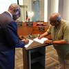 Former Port Arthur ISD Superintendent Johnny Brown, left, and Kenneth Lofton, Sr., right, officially become members of the Port Arthur ISD school board. Photo taken May 16, 2023. Photo by Olivia Malick/ The Enterprise