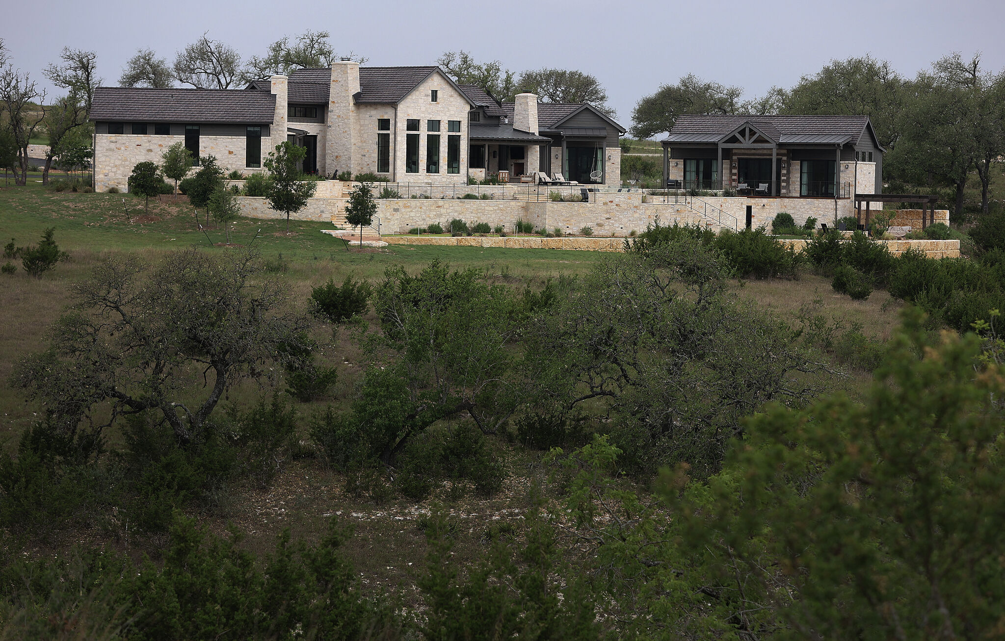 Texas Monthly Hill Country Show Home at Boot Ranch - Transitional