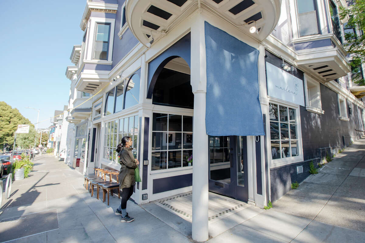 A customer waits to enter Marlena in San Francisco on May 16, 2023.