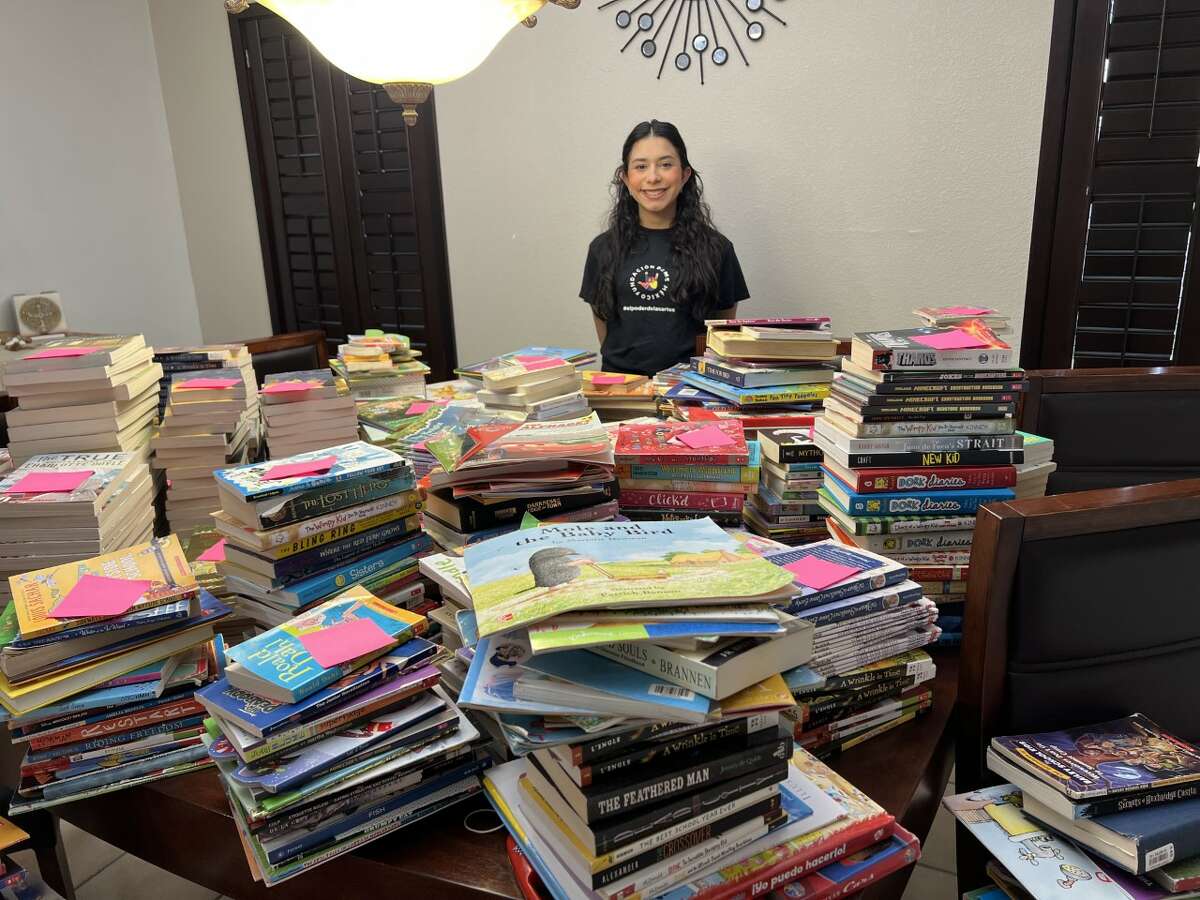 Ana Cecy Chavez, an Alexander High School student and Texas ambassador of PAME Kids collected 1,420 books to be donated to children in Mexico City and Monterrey .