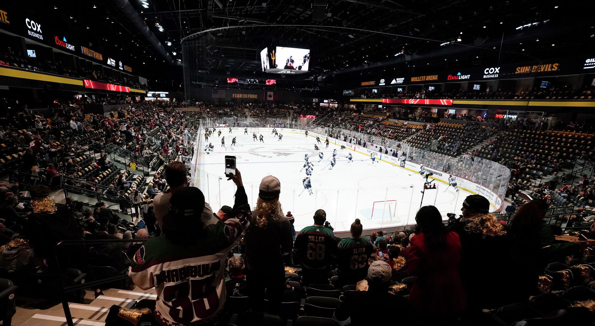 NHL's Phoenix Coyotes go back to college with new arena