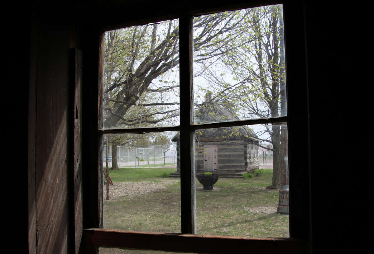 Help preserve Bad Axe historical log cabin village