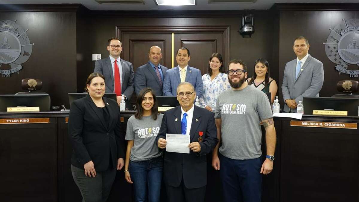 David and Samantha Garza, owners of Print X Press and Saludos Brewing Co., presented a check for $1,000 to the Laredo Autism Coalition at the City Council meeting on Monday, May 15, 2023 after holding a fundraiser throughout April for National Autism Awareness Month.
