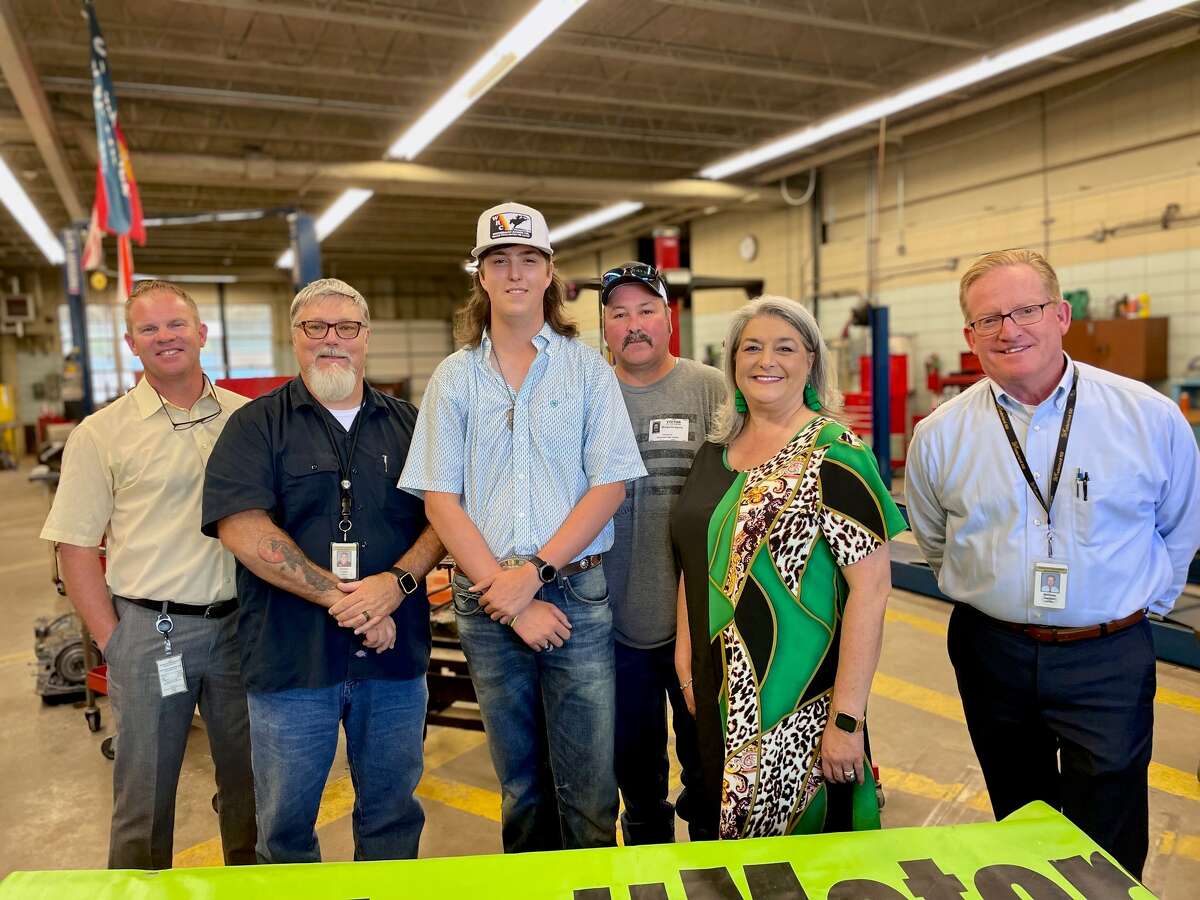 Nederland High School senior Tanner Garcia signs a letter of intent to work for Philpott Motors after graduation, May 17, 2023.