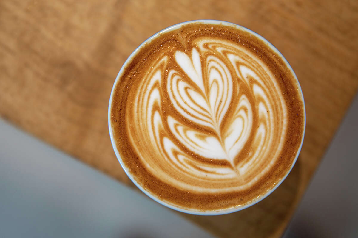 A caffe latte with latte art the new Mr. Espresso Caffe on Broadway in downtown Oakland, Calif. on May 18, 2023.