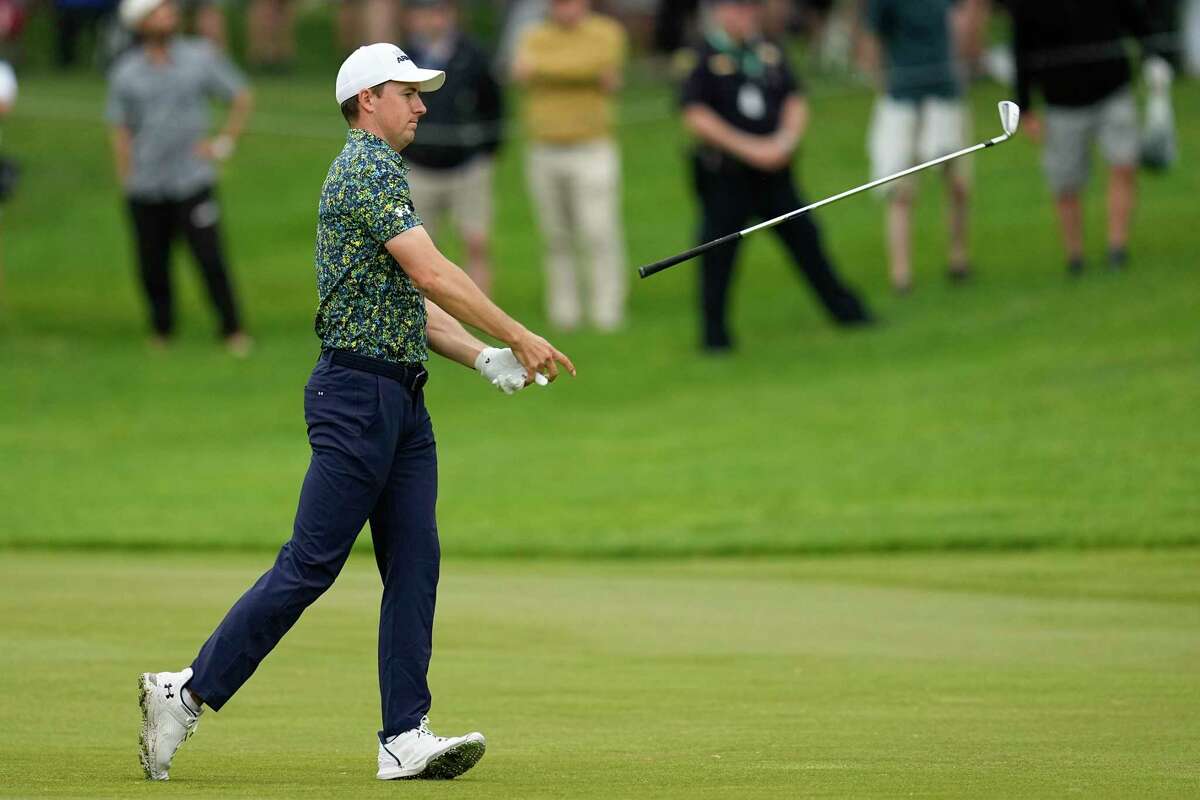 Jordan Spieth tosses his club in the fairway on the seventh hole during the second round of the PGA Championship golf tournament at Oak Hill Country Club on Friday, May 19, 2023, in Pittsford, N.Y.