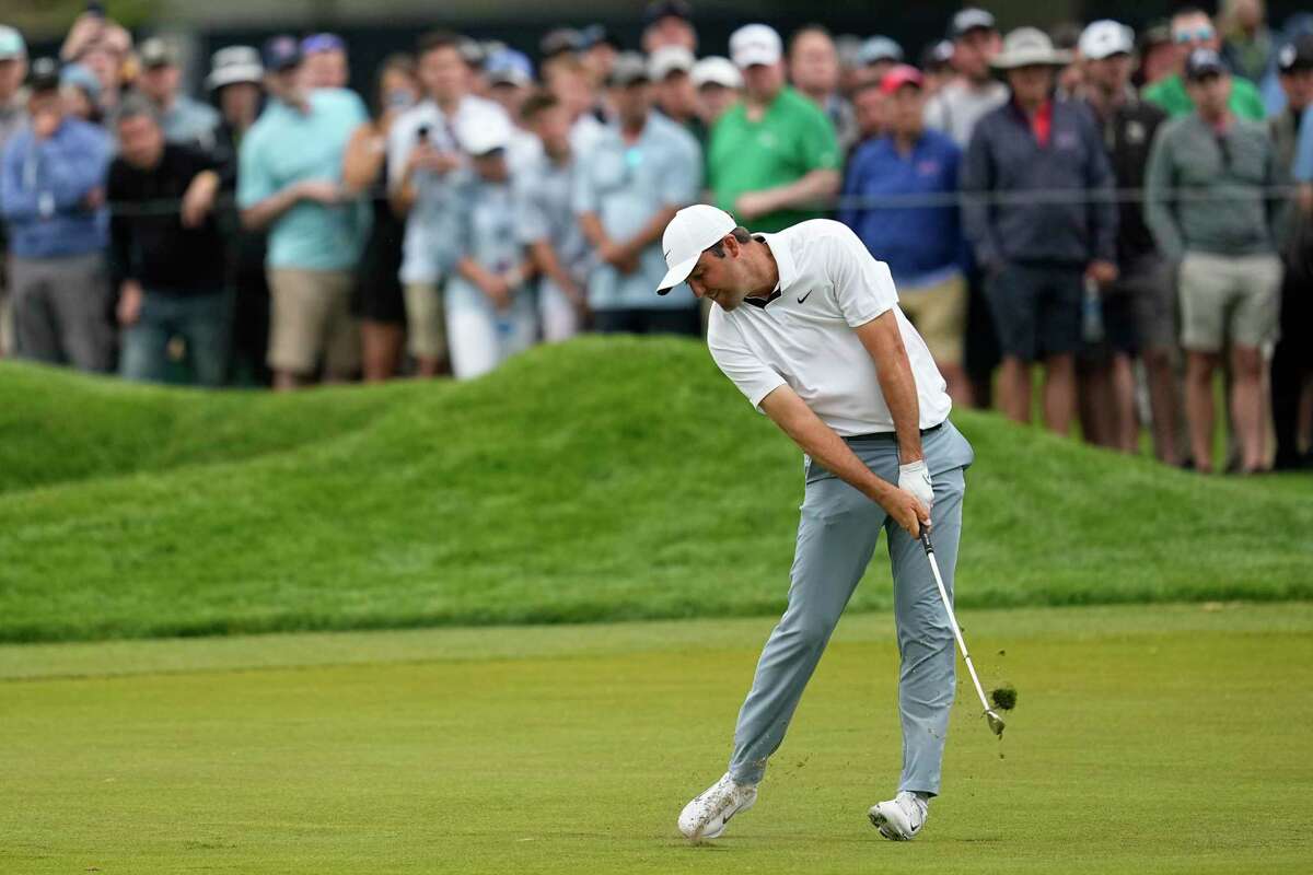 Scottie Scheffler hits from the fairway on the sixth hole during the second round of the PGA Championship golf tournament at Oak Hill Country Club on Friday, May 19, 2023, in Pittsford, N.Y.