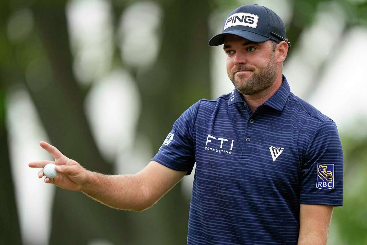 Corey Conners, of Canada, waves after his putt on the fourth hole during the second round of the PGA Championship golf tournament at Oak Hill Country Club on Friday, May 19, 2023, in Pittsford, N.Y.