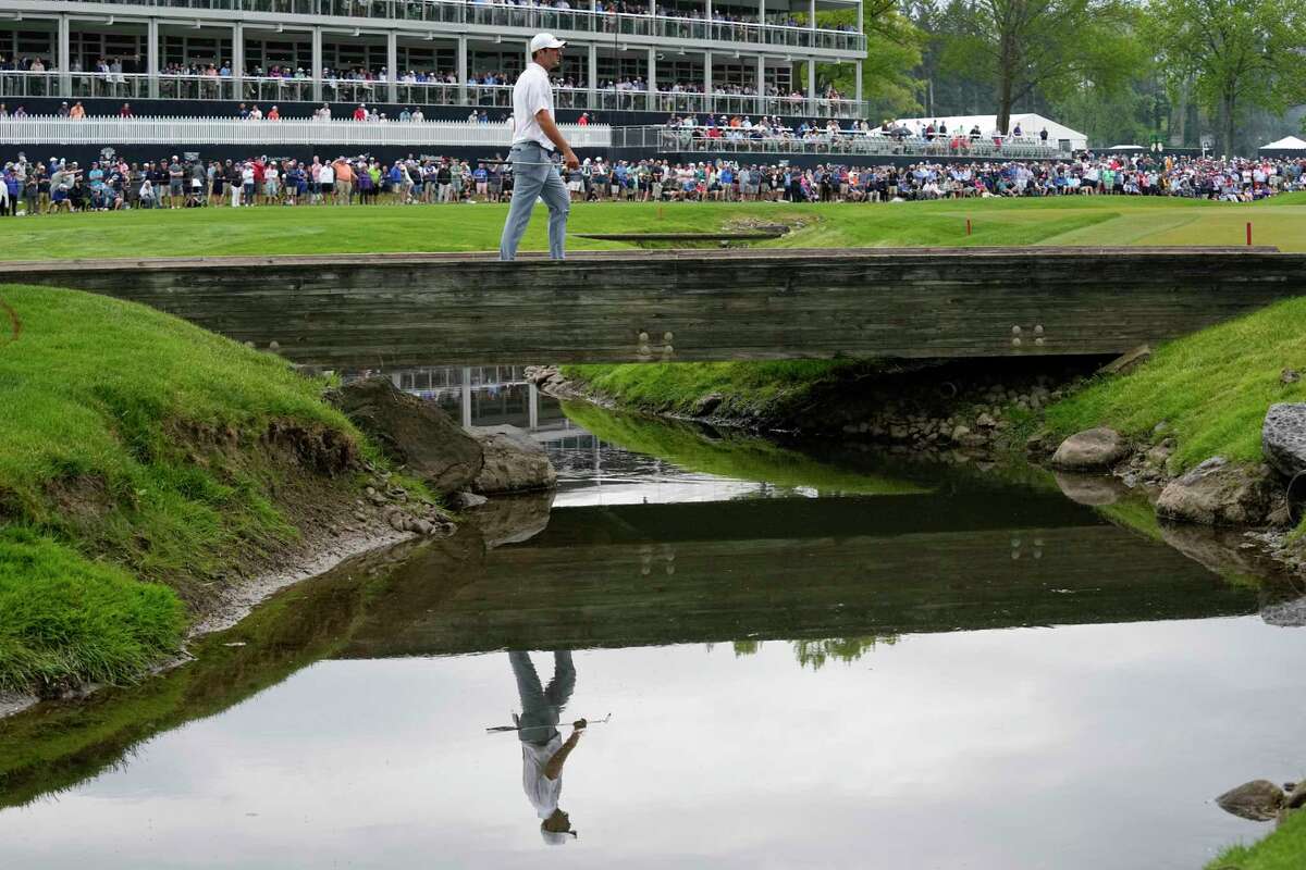 Scottie Scheffler walks on the sixth hole during the second round of the PGA Championship golf tournament at Oak Hill Country Club on Friday, May 19, 2023, in Pittsford, N.Y.