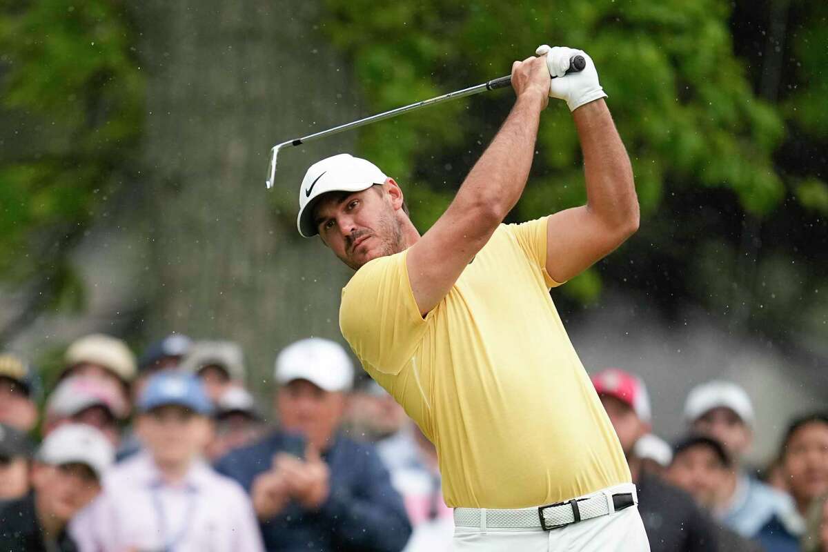 Brooks Koepka watches his tee shot on the fifth hole during the second round of the PGA Championship golf tournament at Oak Hill Country Club on Friday, May 19, 2023, in Pittsford, N.Y.