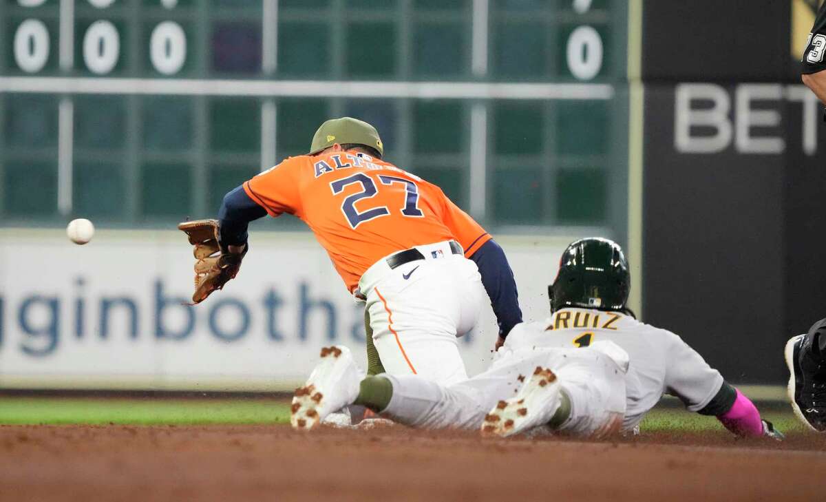 Jose Altuve, Astros walk tall as run in 9th beats A's