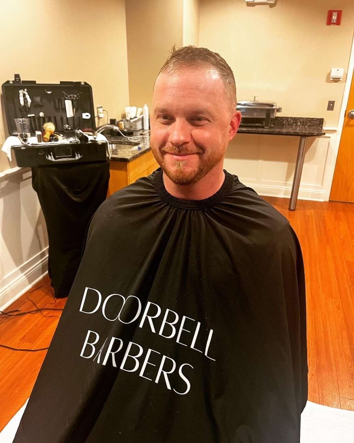 Cody Johnson gets his hair cut by CT barber before Bridgeport concert