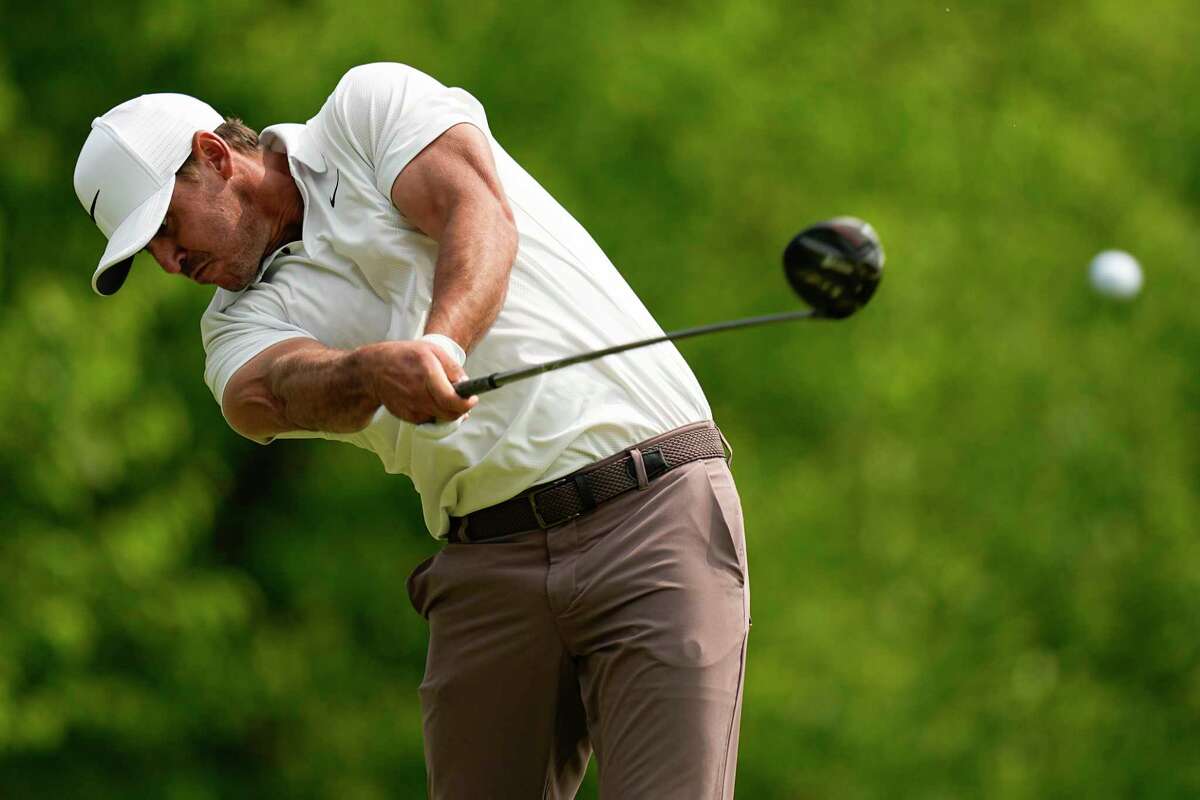 Brooks Koepka hits his tee shot on the fourth hole during the final round of the PGA Championship golf tournament at Oak Hill Country Club on Sunday, May 21, 2023, in Pittsford, N.Y.