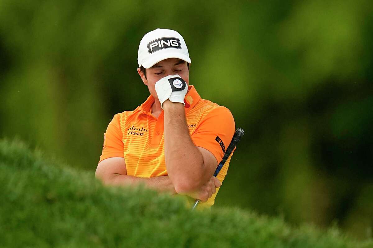 Viktor Hovland, of Norway, reacts after failing to get his ball out of the bunker on the 16th hole during the final round of the PGA Championship golf tournament at Oak Hill Country Club on Sunday, May 21, 2023, in Pittsford, N.Y.