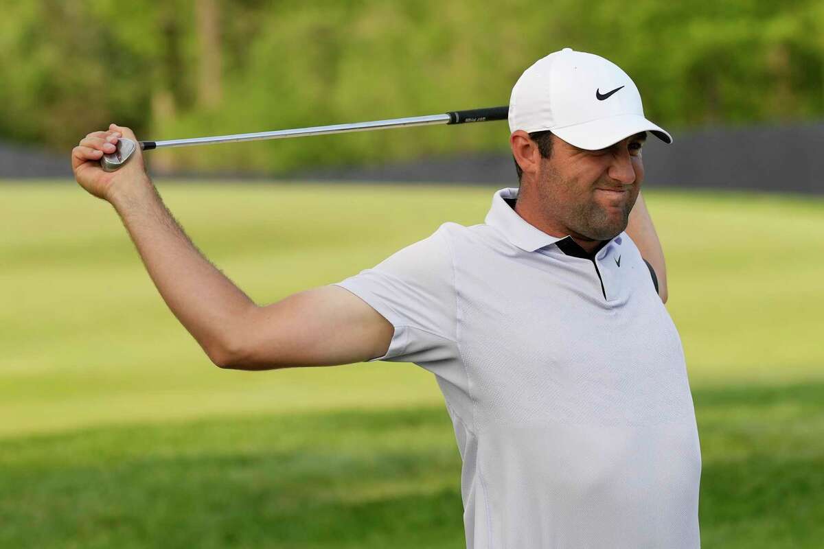 Scottie Scheffler reacts after missing a shot on the 14th hole during the final round of the PGA Championship golf tournament at Oak Hill Country Club on Sunday, May 21, 2023, in Pittsford, N.Y.