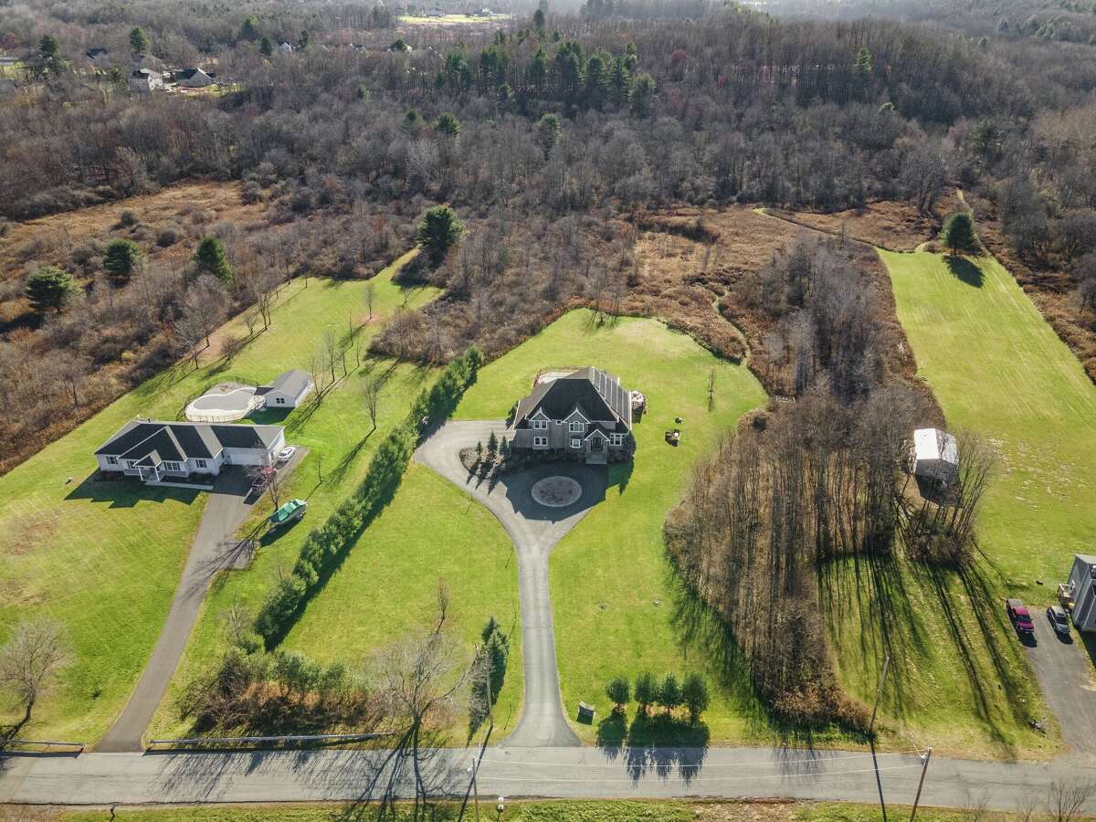 Altamont estate on 12 acres with finished basement for sale at 1.3M
