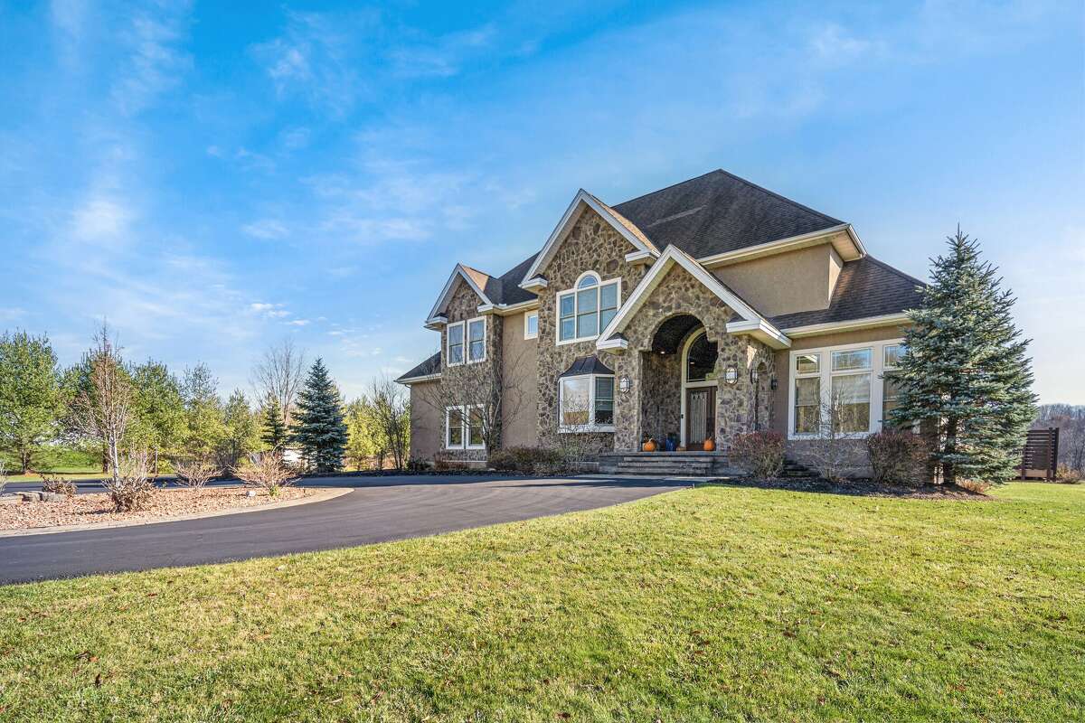 Altamont estate on 12 acres with finished basement for sale at 1.3M