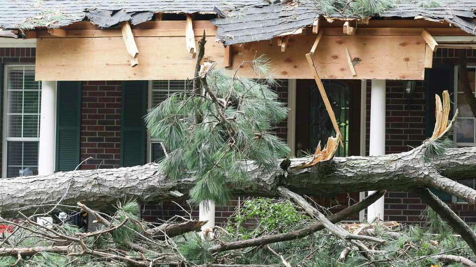 A damaged home is seen in the Cape Malibu subdivision after Tuesday's storm brought heavy winds through the area, May 24, 2023, in Willis. The National Weather Service posted a tornado warning Tuesday afternoon for several areas north of Houston.