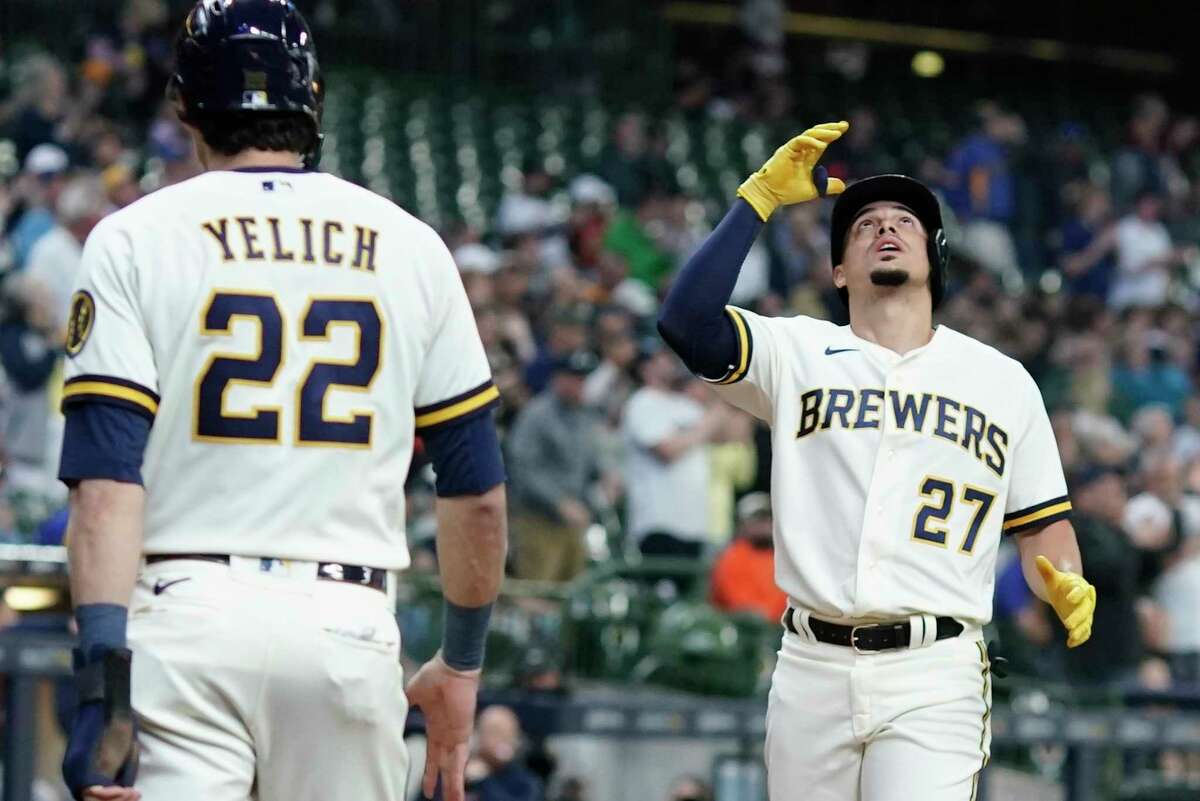Milwaukee Brewers' Willy Adames reacts after hitting a two-run home run during the first inning of a baseball game against the Houston Astros Wednesday, May 24, 2023, in Milwaukee.