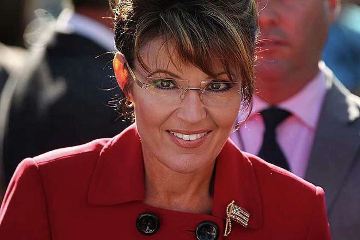 RENO, NV - OCTOBER 18: Politician and conservative activist Sarah Palin prepares to speak at the launch for the Tea Party Express national tour which is kicked off with a rally in Reno on October 18, 2010 in Reno, Nevada. The tour, part of an initiative to get conservatives elected to the House and Senate, will move across country and conclude on November 1, 2010 in Concord, New Hampshire the day before the contentious mid-term elections. (Photo by Spencer Platt/Getty Images) *** Local Caption *** sarah palin
