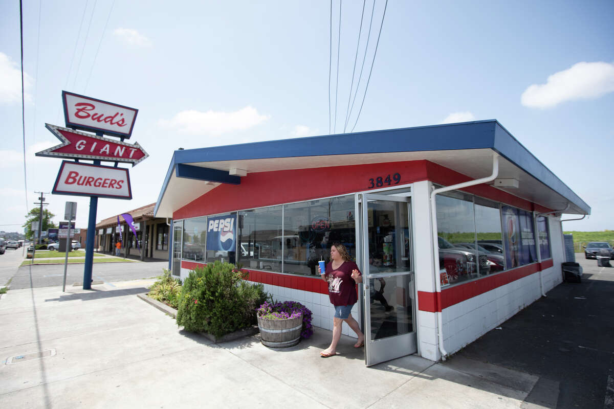 A customer walks out of Bud's Giant Burgers in Vallejo, Calif. on May 24, 2023.