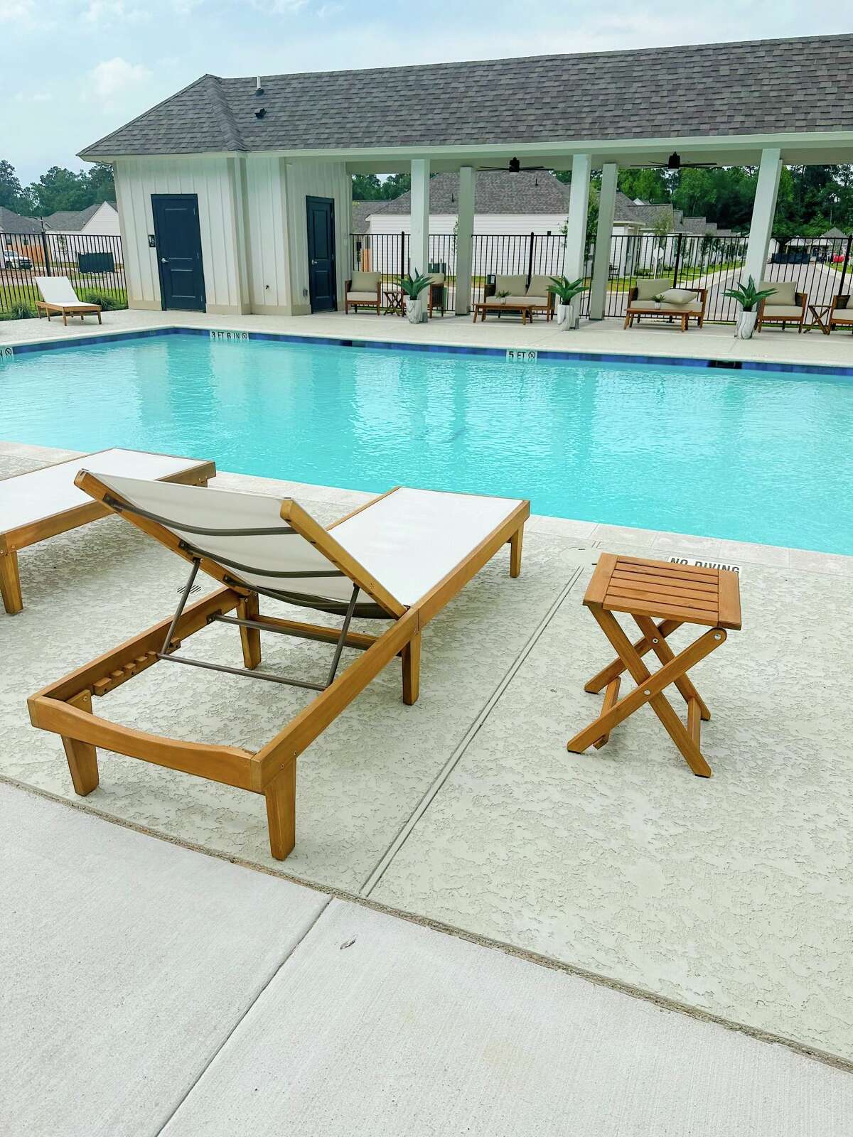 Amenities at the Cottages at Buckshot Landing include a pool and clubhouse. The development is planned for 129 rental homes on Buckshot Lane off FM 1488 in Magnolia.