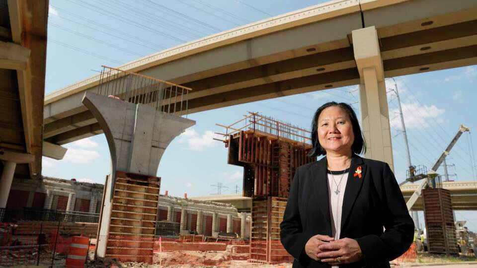 Eliza Paul, district engineer for the Texas Department of Transportation Houston office, is shown along Westpark at Loop 610 construction Thursday, May 25, 2023, in Houston.