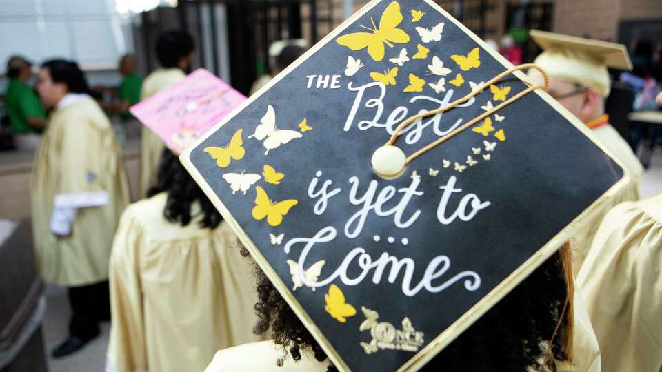 A senior's decorated graduation cap is seen before Conroe High School's graduation ceremony at the Cynthia Woods Mitchell Pavilion, Thursday, May 25, 2023, in The Woodlands.