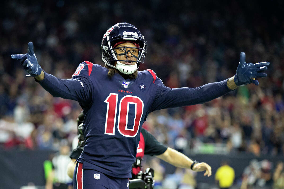 DeAndre Hopkins #10 of the Houston Texans celebrates after catching a pass for a touchdown during the second half of a game against the Indianapolis Colts at NRG Stadium on November 21, 2019 in Houston.
