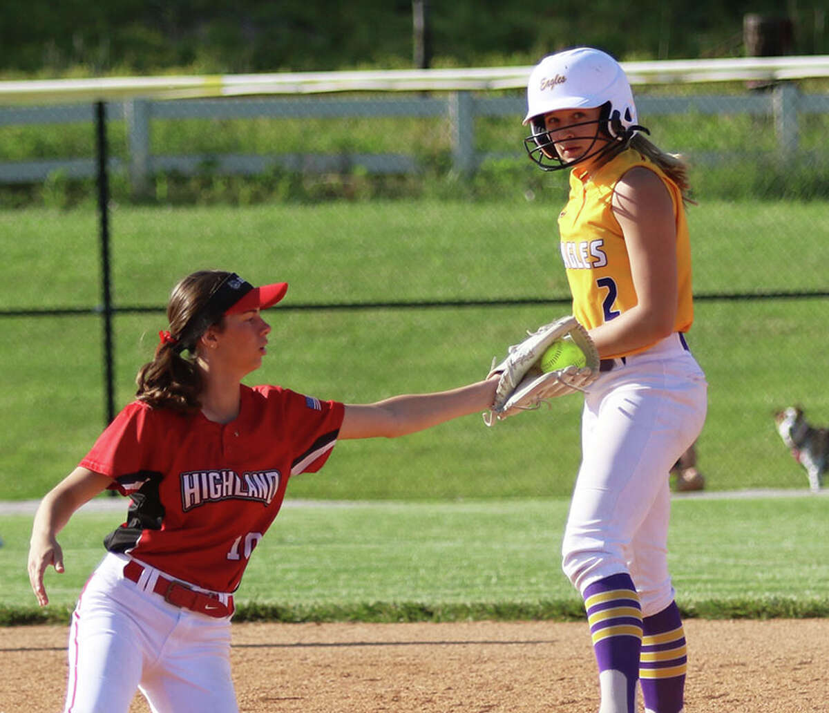 CM's Avari Combes (right) stands on second with a double while Karli Dant holds a late tag on Friday in the title game of the CM Class 3A Regional at the Bethalto Sports Complex.