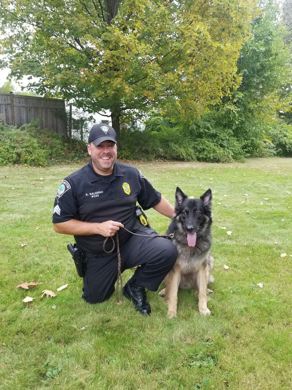 Retired Southington Police Department K-9 Lou poses with his handler, retired Sgt. Stephen Salerno. 
