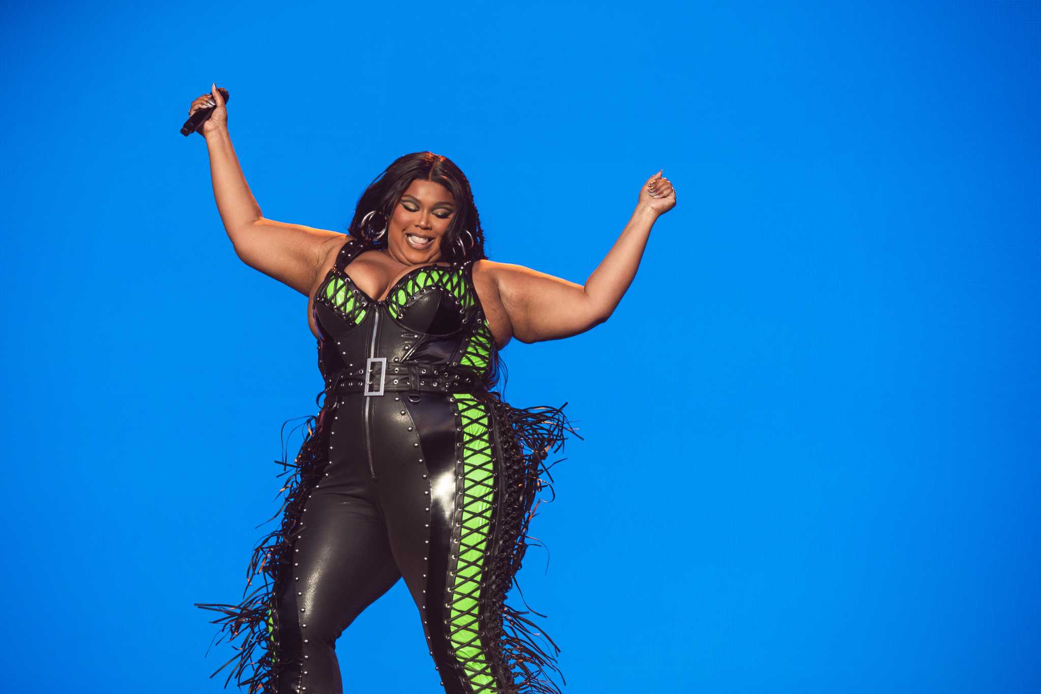 Lizzo wears pink LA Roxx jumpsuit to Global Citizens concert