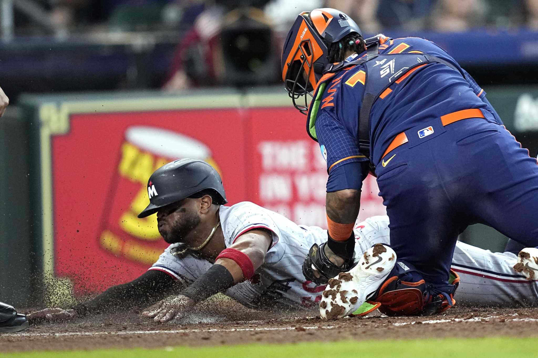 Houston Astros' Jose Altuve runs the bases after hitting a grand slam  against the Minnesota Twins during the seventh inning of a baseball game  Monday, May 29, 2023, in Houston. (AP Photo/David