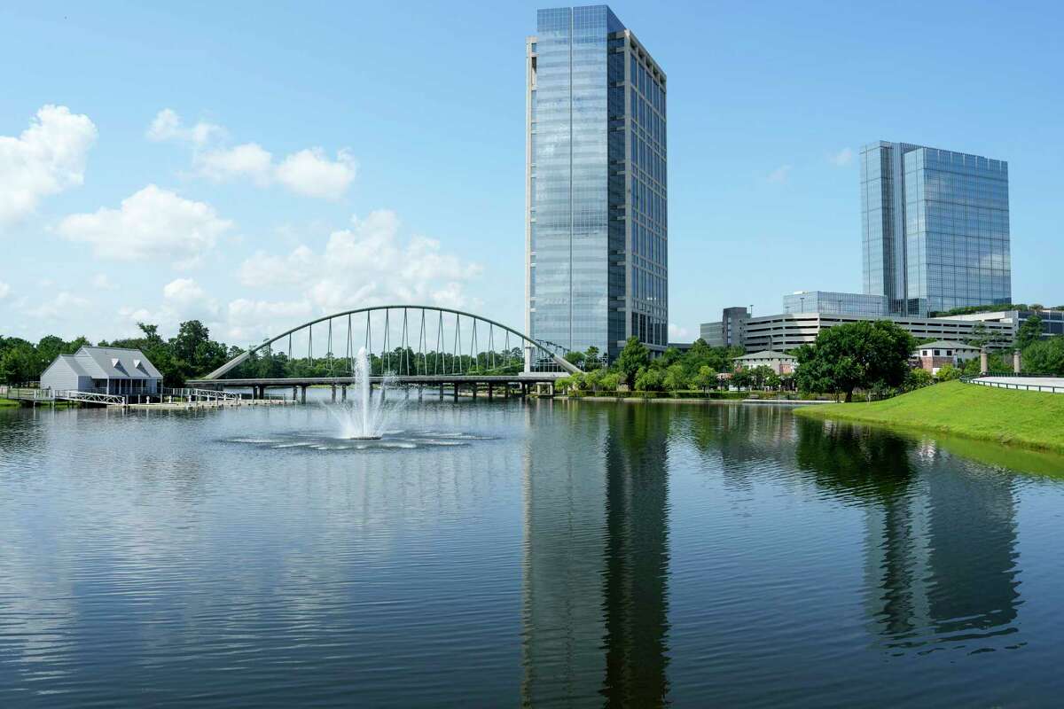 The Woodlands Towers are shown in front of a lake on Tuesday, May 30, 2023 in The Woodlands. Occidental Petroleum is the main tenant in the left tower.